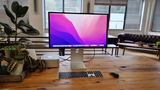 Studio Display on wooden desk