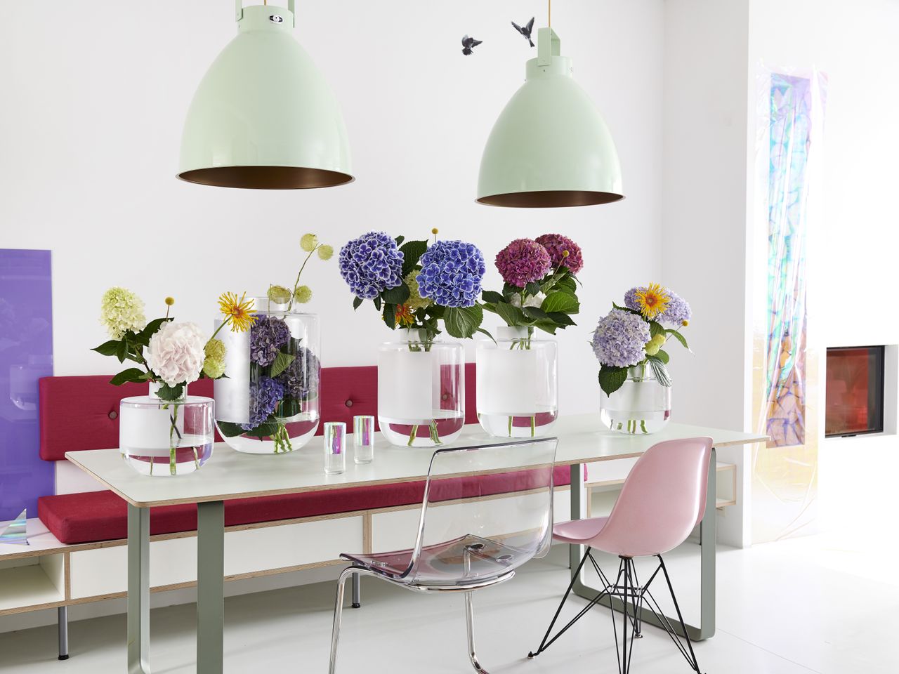 hydrangeas in vases on a table