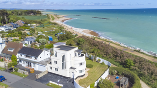 Aerial view of art deco property near seaside