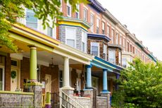 townhomes in Baltimore, Maryland with trees and colorful architecture