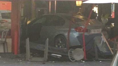 A BMW deliberately driven into a pizzeria on Paris outskirts