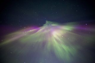 2011 draconid meteor shower and northern lights in Greenland.