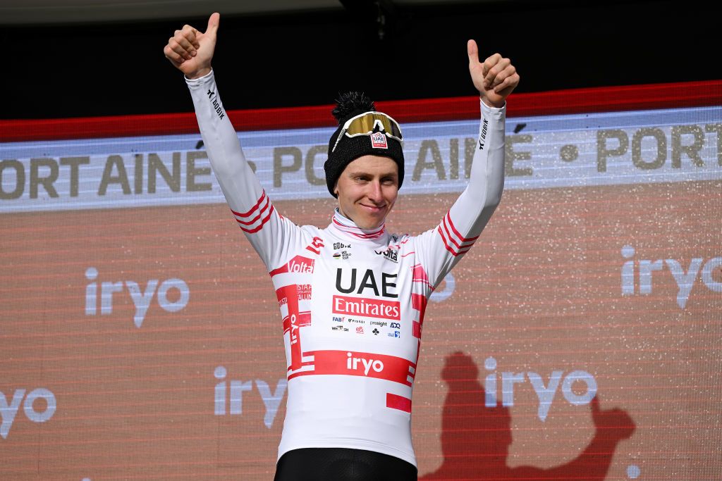 PORT AINE SPAIN MARCH 20 Tadej Pogacar of Slovenia and UAE Emirates Team celebrates at podium as Red Mountain Jersey winner during the 103rd Volta Ciclista a Catalunya 2024 Stage 3 a 1767km stage from Sant Joan de les Abadesses to Port Aine 1967m UCIWT on March 20 2024 in Port Aine Spain Photo by David RamosGetty Images