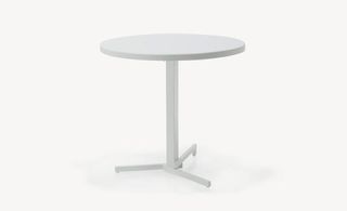 white outdoor round table from collection titled Mia for Emu designed by Jean Nouvel