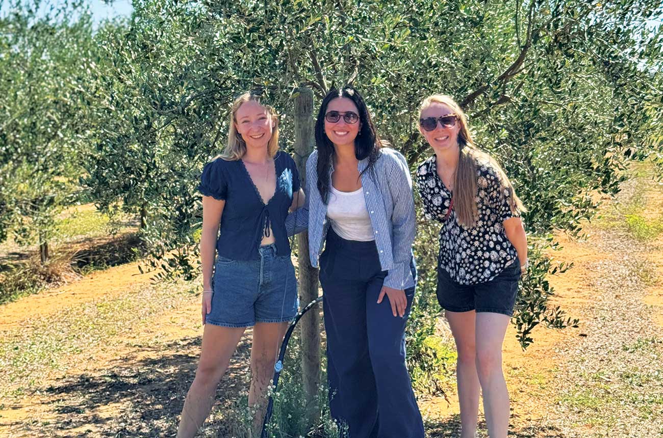 Natalie Earl (right) withAnna Taurino (centre) in olive grove