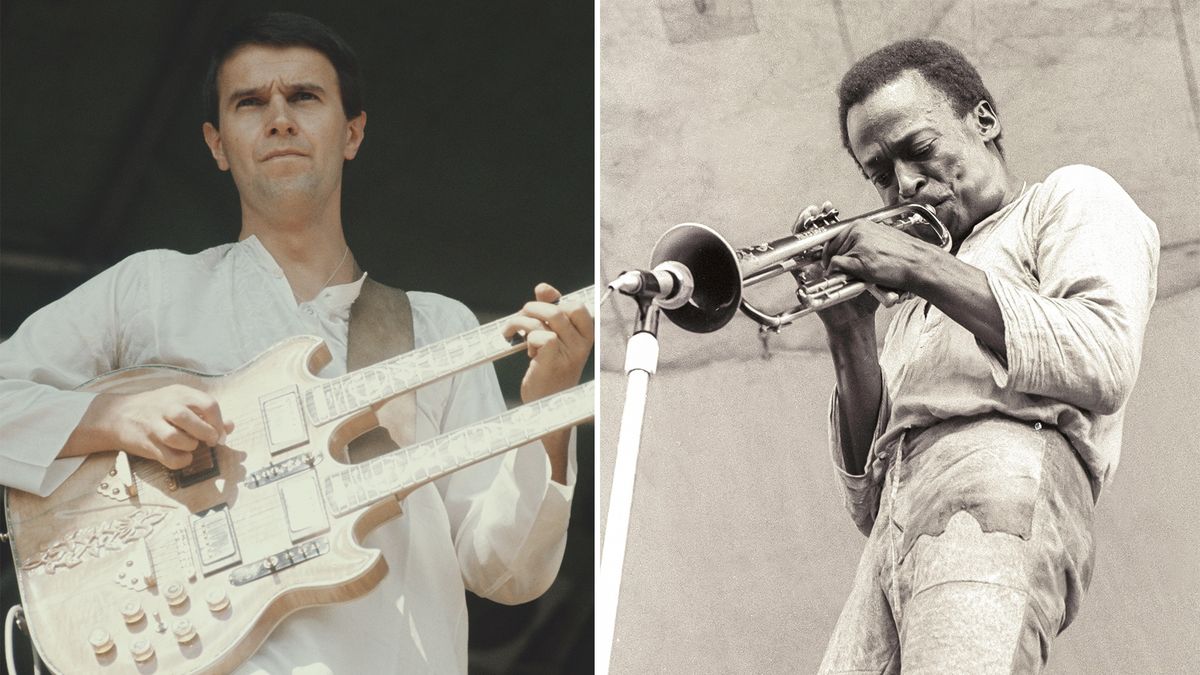 John McLaughlin (left) and Miles Davis perform onstage