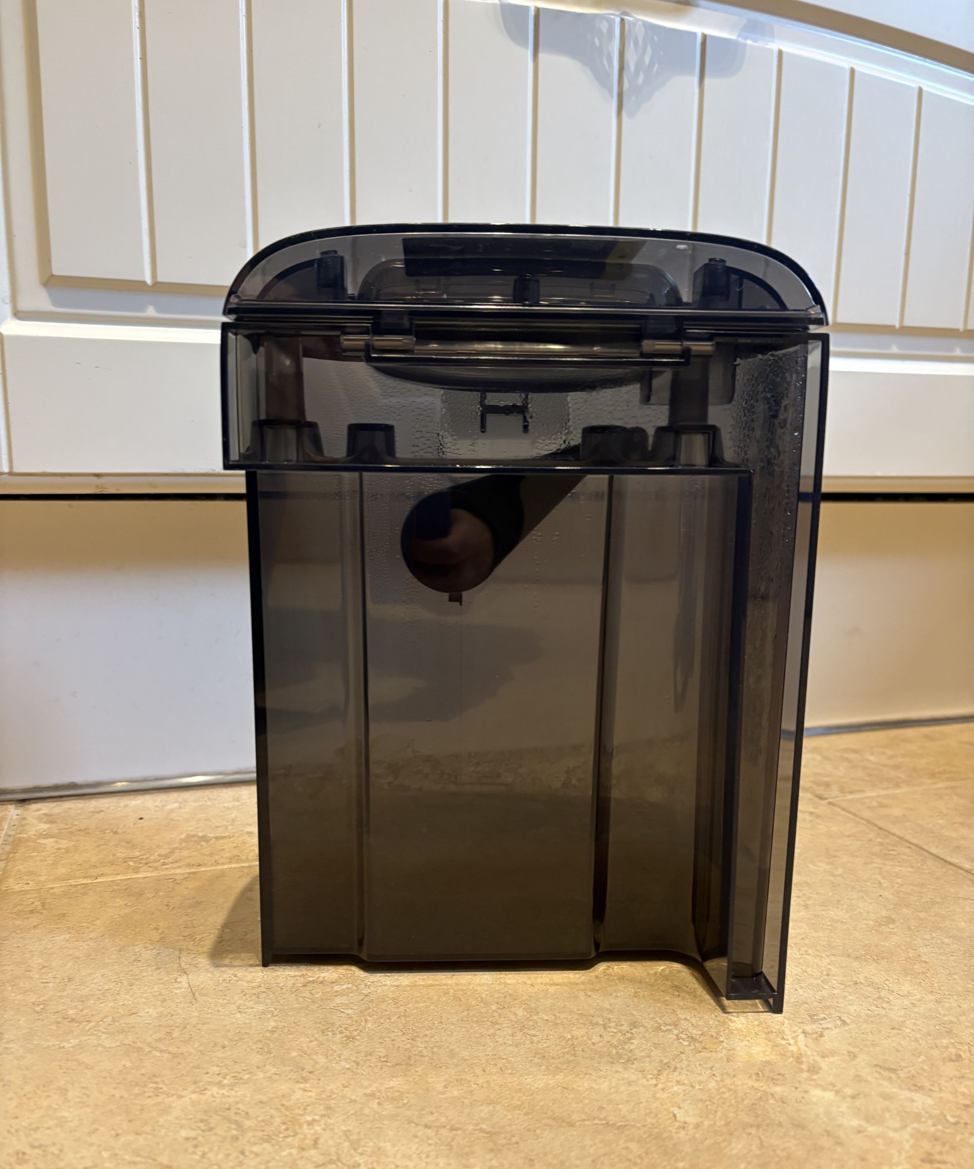 eufy Omni E25 dirty water tank showing thick dark water in the bottom quarter