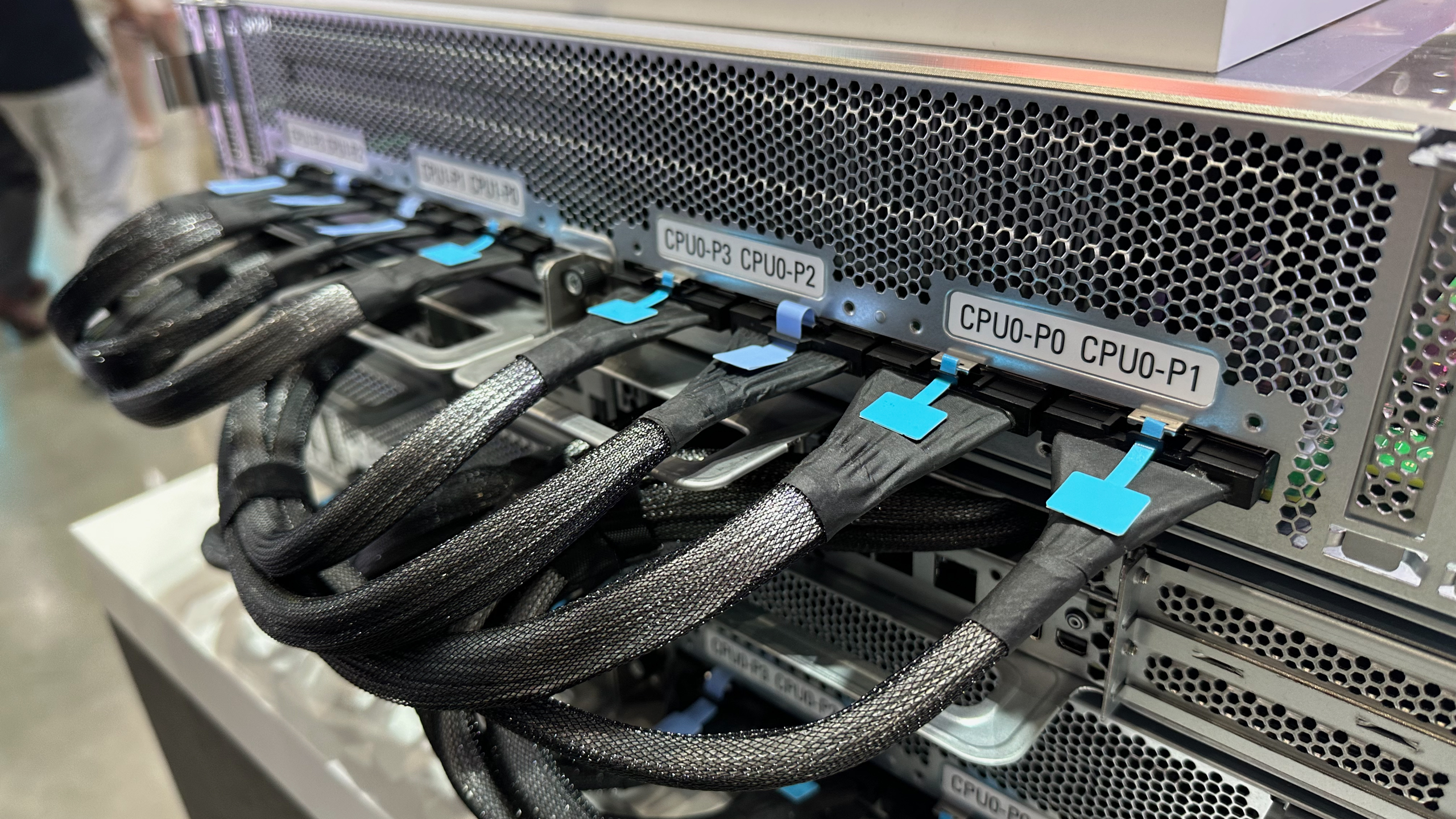 Interconnections for 128-way AMD Instinct MI350X system from Pegatron