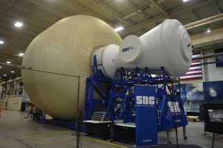 Sierra Nevada Corp.'s Lunar Gateway ground prototype is deployed at NASA's Johnson Space Center in Houston on Aug. 21, 2019. The Large Inflatable Fabric Environment, or LIFE, habitat is inflated to its 27-foot (8 meters) expanded diameter.