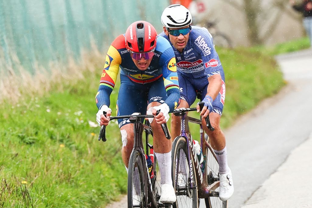 Denmark's Mads Pedersen of Lidl-Trek (L) and Belgium's Gianni Vermeersch of Alpecin-Deceuninck compete in the men's race of the 'Ronde van Vlaanderen/ Tour des Flandres one day cycling race, 270,8km from Antwerp to Oudenaarde, on March 31, 2024. (Photo by DAVID PINTENS / Belga / AFP) / Belgium OUT