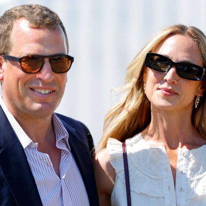 Peter Phillips and Harriet Sperling smiling and wearing sunglasses