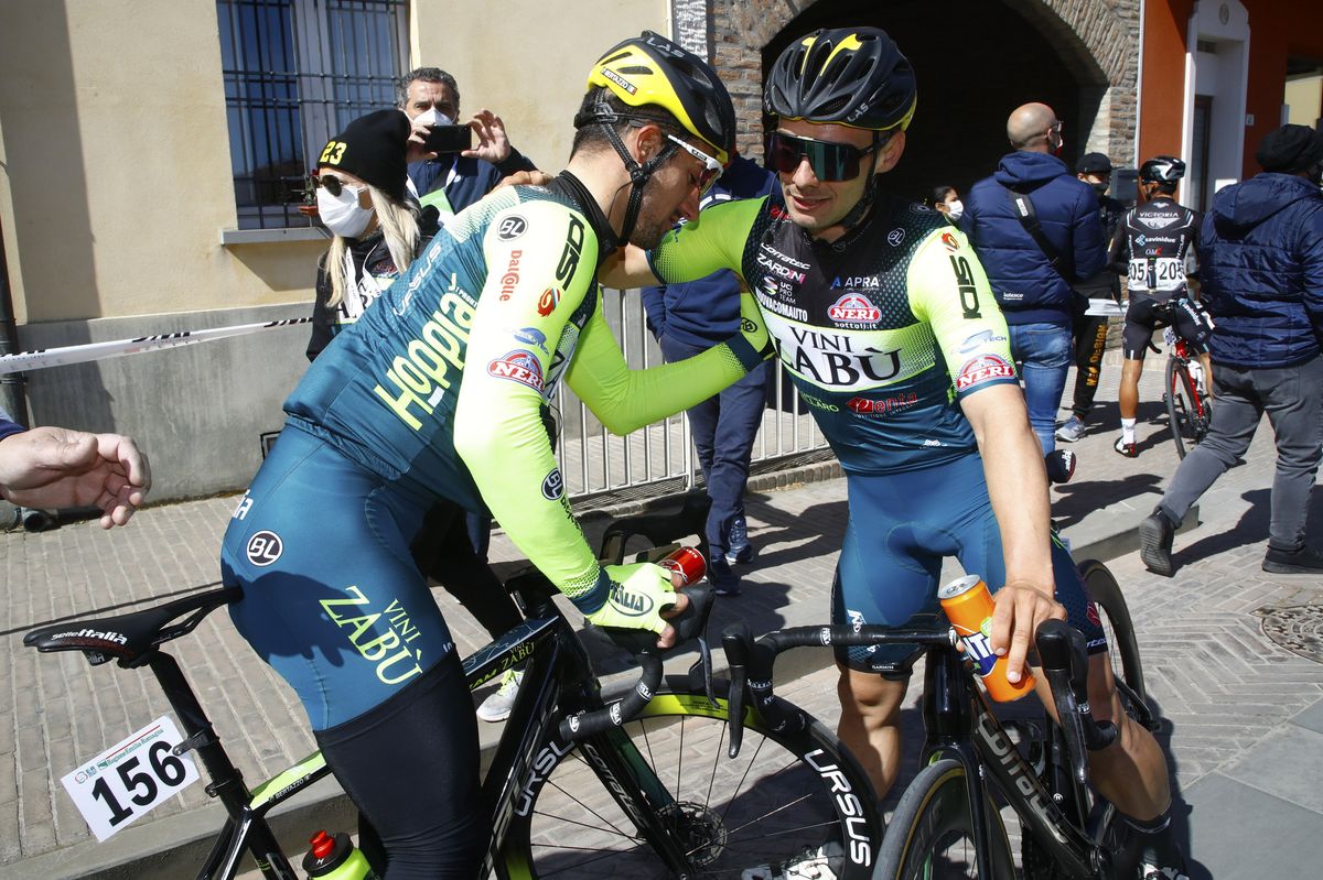 Jakub Mareczko celebrates with his Vini Zabu teammate after winning stage 1a of the Settimana Internazionale Coppi e Bartali