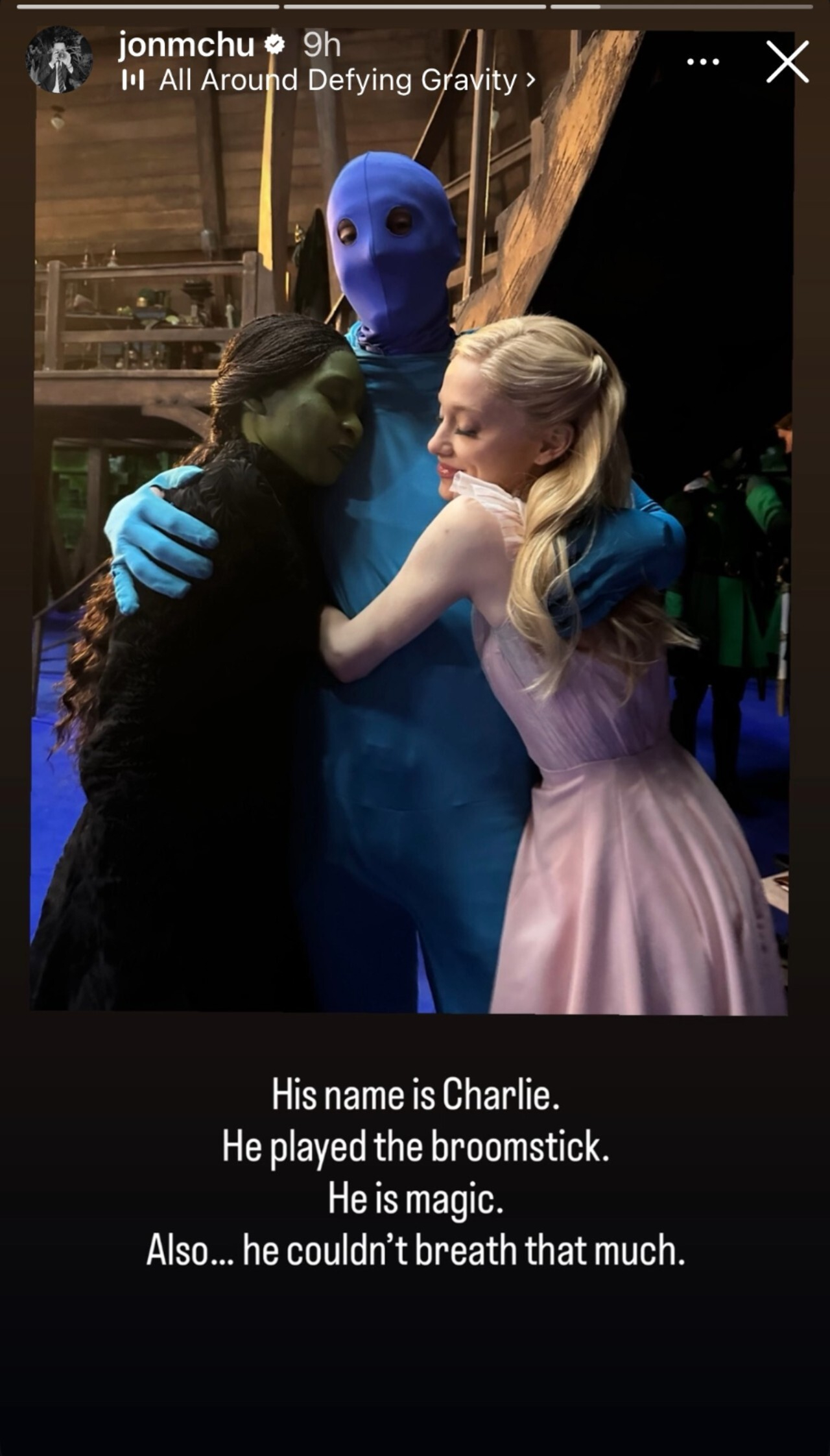 Cynthia Erivo and Ariana Grande hugging Charlie who played the broom in Wicked found on Jon M. Chu's Instagram stories.