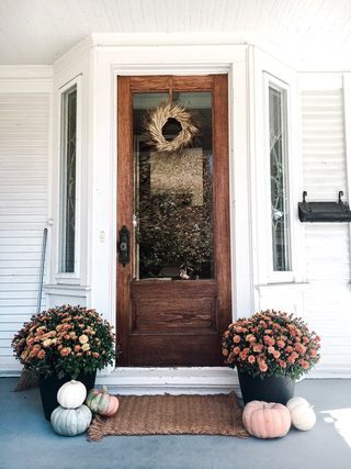 fall front decor wreath and flower planters