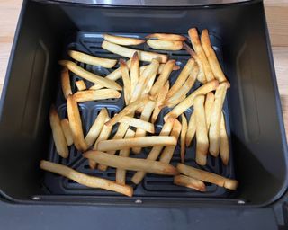 French fries cooked in the Cuisinart basket air fryer