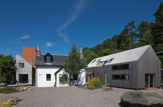 large extension added to cottage with metal cladding photographed by david barbour