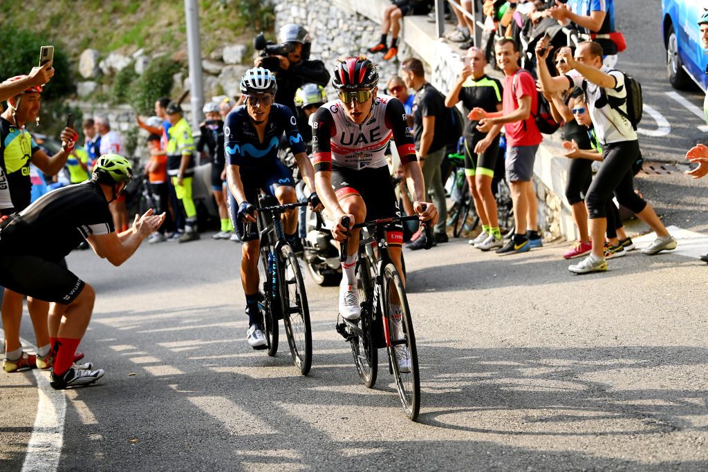 COMO ITALY OCTOBER 08 LR Enric Mas Nicolau of Spain and Movistar Team and Tadej Pogacar of Slovenia and UAE Team Emirates compete in the breakaway during the 116th Il Lombardia 2022 a 253km one day race from Bergamo to Como iLombardia on October 08 2022 in Como Italy Photo by Tim de WaeleGetty Images
