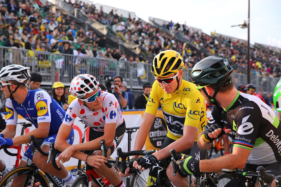 Warren Barguil, Chris Froome and Mark Cavendish chat on the start line in Saitama.