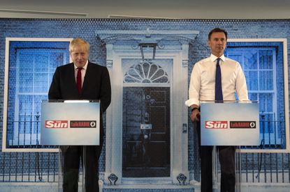 PORTSMOUTH, ENGLAND - JUNE 26: Boris Johnson and Jeremy Hunt take part in a Hustings debate hosted by the Sun/Talk Radio at Talk Radio in The News Building on July 15, 2019 in London, England