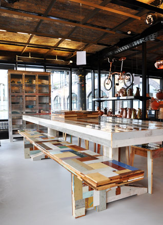 Tom Dixon: A view across the industrial surrounds of the space with furniture by Piet Hein Eek