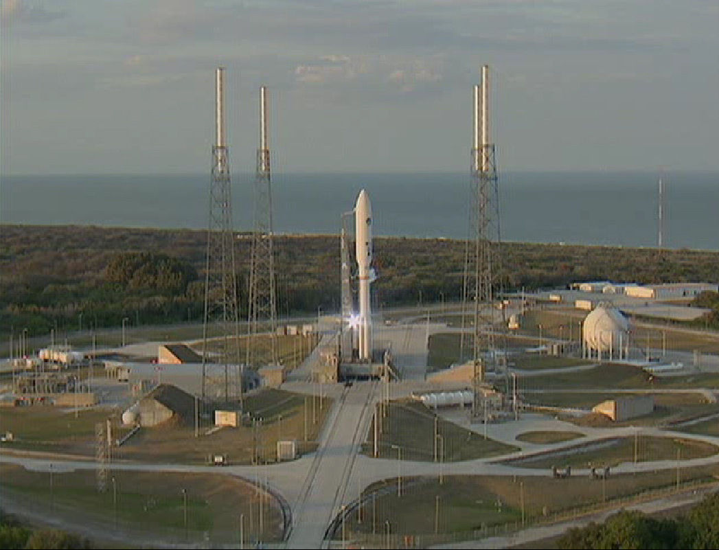 A United Launch Alliance rocket carrying the U.S. Navy&#039;s MUOS-1 satellite stands poised for launch in this view from a ULA webcast on Feb. 16, 2012.