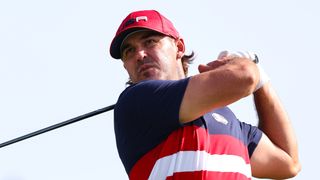 Brooks Koepka takes a tee shot during the Ryder Cup at Marco Simone Golf and Country Club