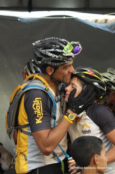 A couple hugs after the stage