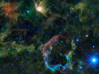 NASA's Wide-field Infrared Survey Explorer (WISE) shows a colorful view of supernova remnant IC 443, also known as the Jellyfish Nebula. IC 443 formed from the remains of a star that exploded into a supernova between 5,000 and 10,000 years ago. Unusually,