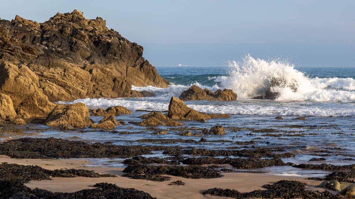 water crashing on rocks