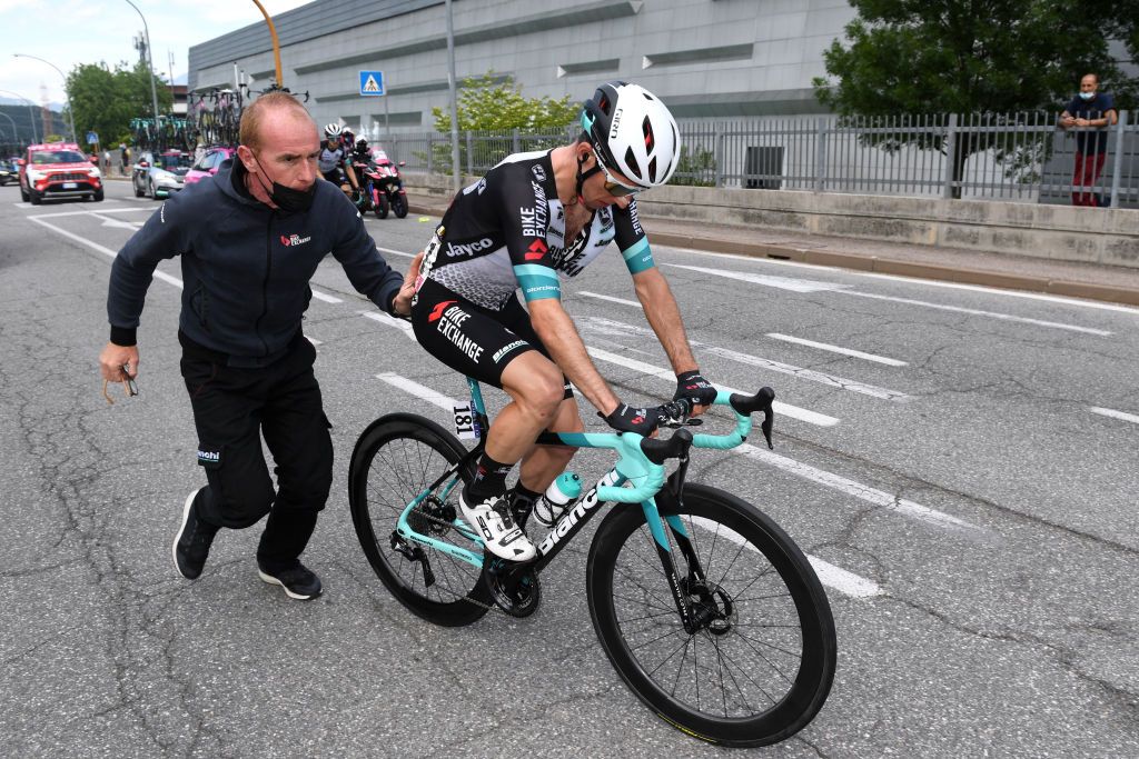 SEGA DI ALA ITALY MAY 26 Simon Yates of United Kingdom and Team BikeExchange Fausto Oppici of Italy Mechanic of Team BikeExchange during the 104th Giro dItalia 2021 Stage 17 a 193km stage from Canazei to Sega di Ala 1246m UCIworldtour girodiitalia Giro on May 26 2021 in Sega di Ala Italy Photo by Tim de WaeleGetty Images