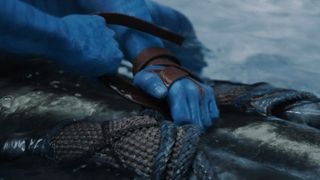 Still of Jake's hand from Avatar: The Way of Water