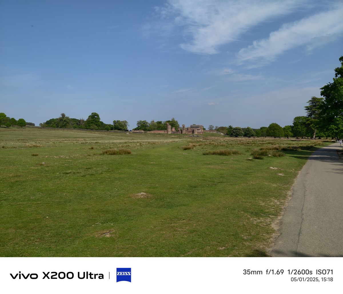 Old ruins in the distance across a field