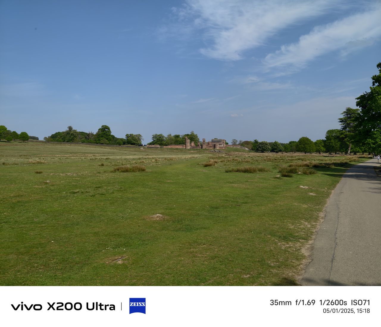 Old ruins in the distance across a field