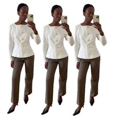 sylvie wears cinched white blazer, trousers, and pointed toe heels