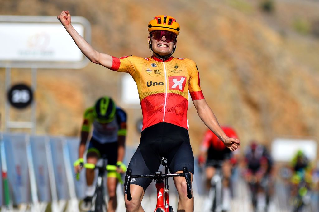 QURAYYAT OMAN FEBRUARY 12 Anthon Charmig of Denmark and UNO X Pro Cycling Team celebrates winning during the 11th Tour Of Oman 2022 Stage 3 a 180km stage from Sultan Qaboos University to Qurayyat 240m TourofOman on February 12 2022 in Qurayyat Oman Photo by Dario BelingheriGetty Images