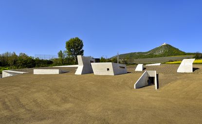 Archeopark is a new concrete campus in the village of Pavlov
