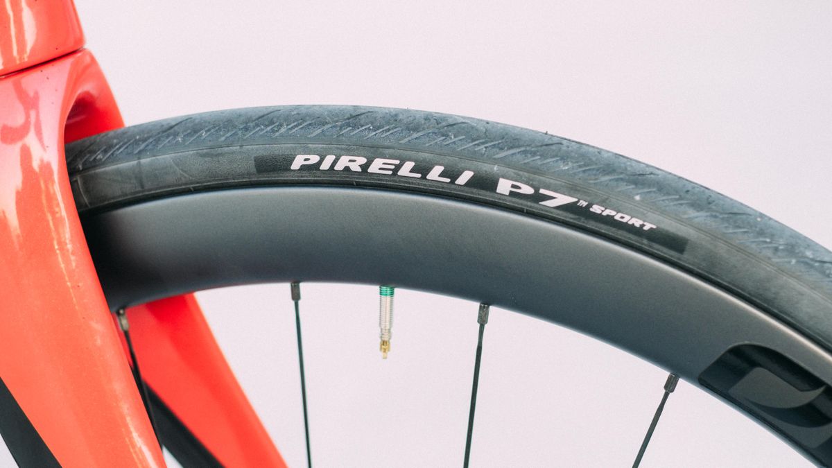 A red and black pinarello F road bike
