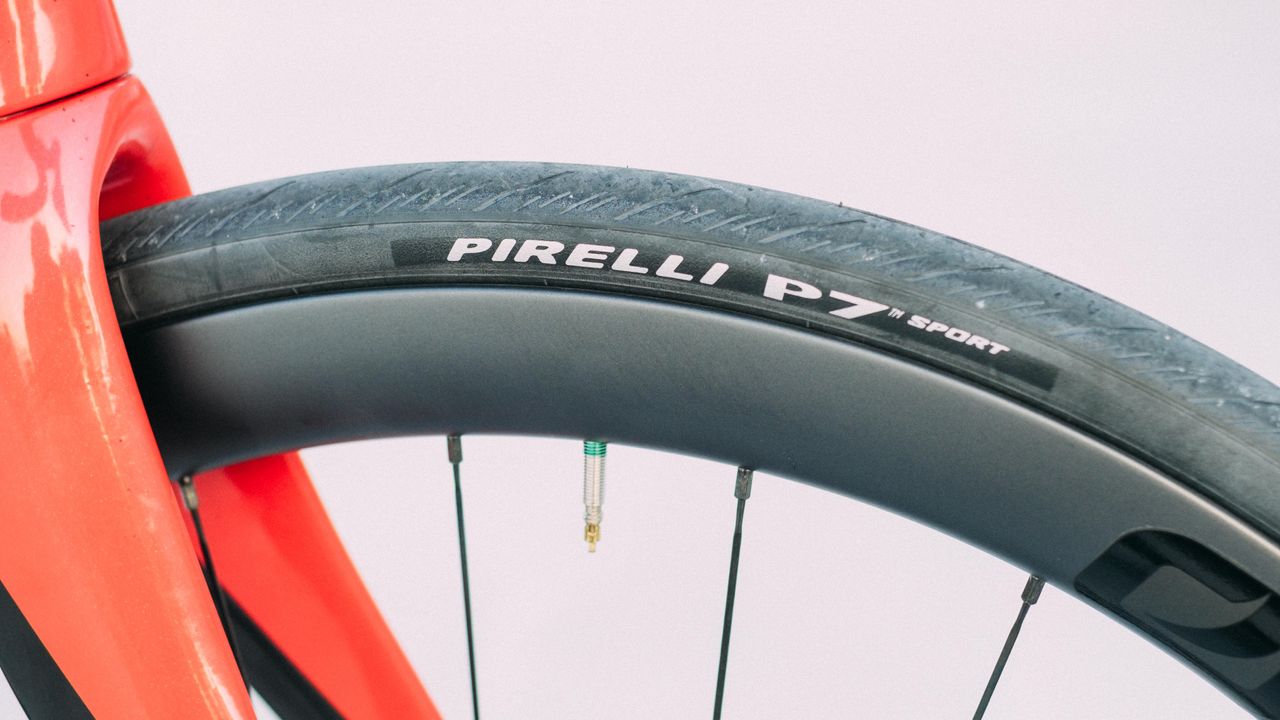A red and black pinarello F road bike