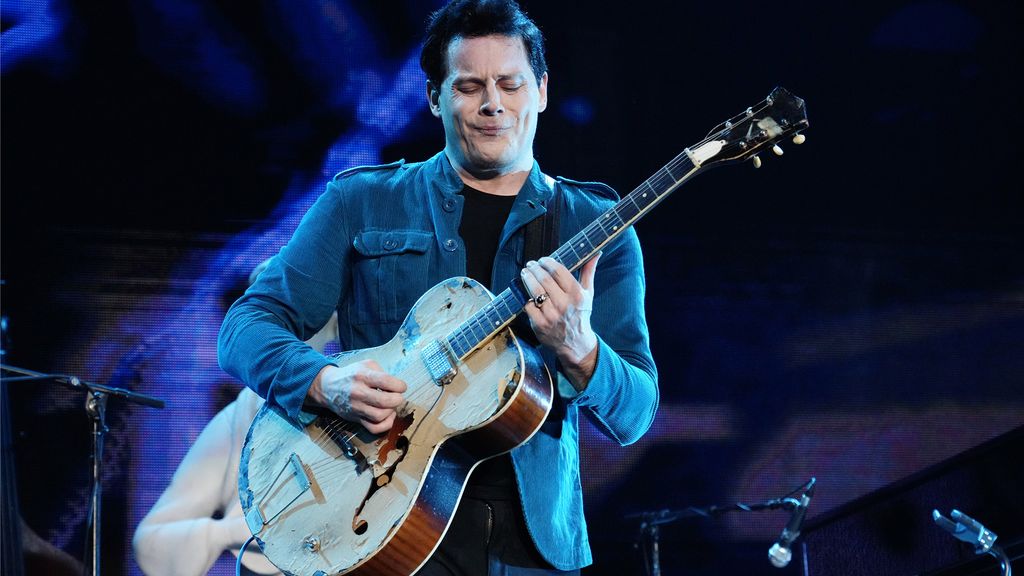 10 iconic guitarists who had surprising day jobs before they were