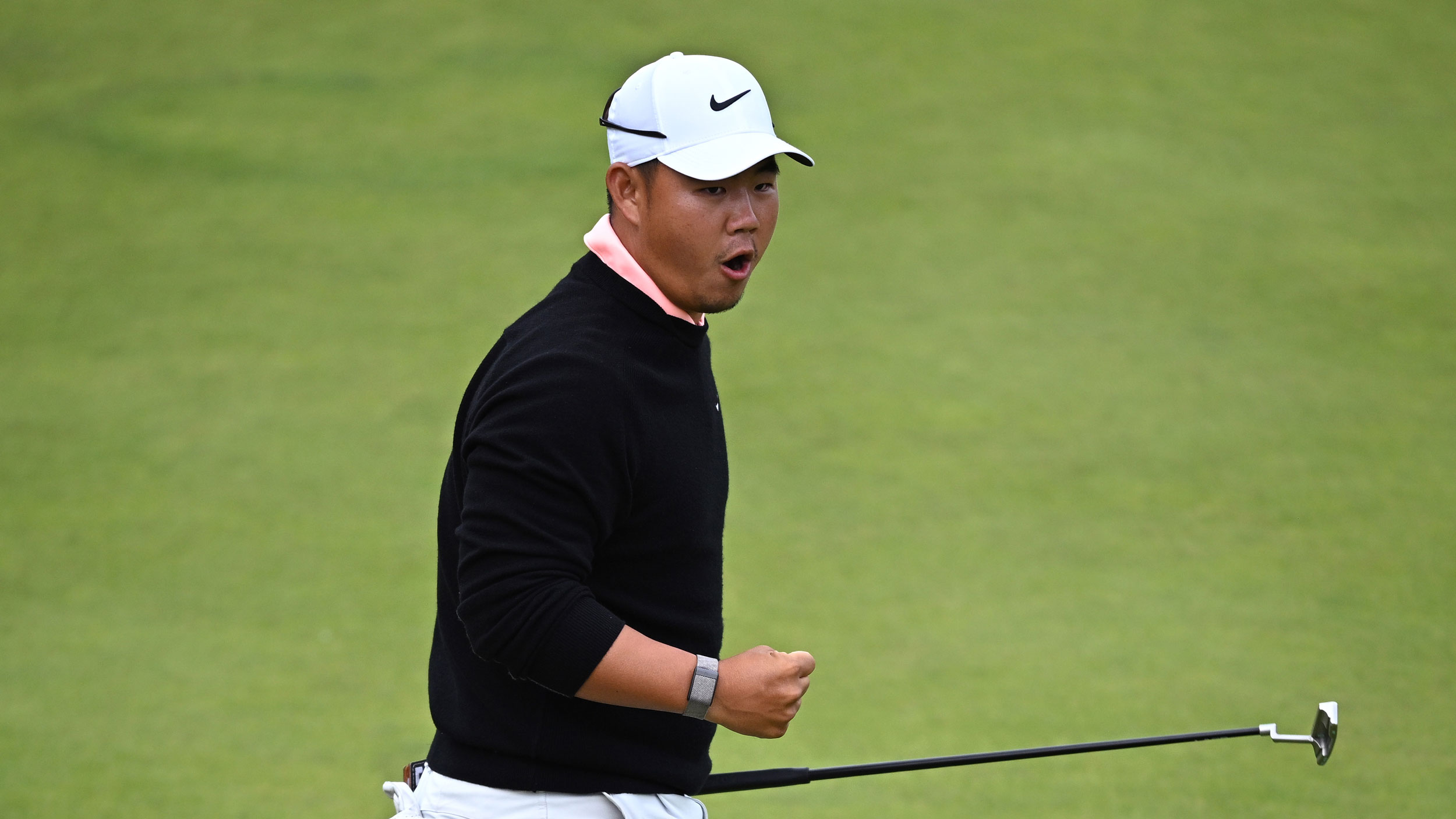Tom Kim celebrates after holing a putt at the 2026 Genesis Scottish Open final round