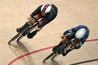 Britain's Emma Finucane and Colombia's Martha Bayona Pineda compete in a women's track cycling sprint quarter-final race 2 of the Paris 2024 Olympic Games at the Saint-Quentin-en-Yvelines National Velodrome in Montigny-le-Bretonneux, south-west of Paris, on August 10, 2024. (Photo by SEBASTIEN BOZON / AFP)