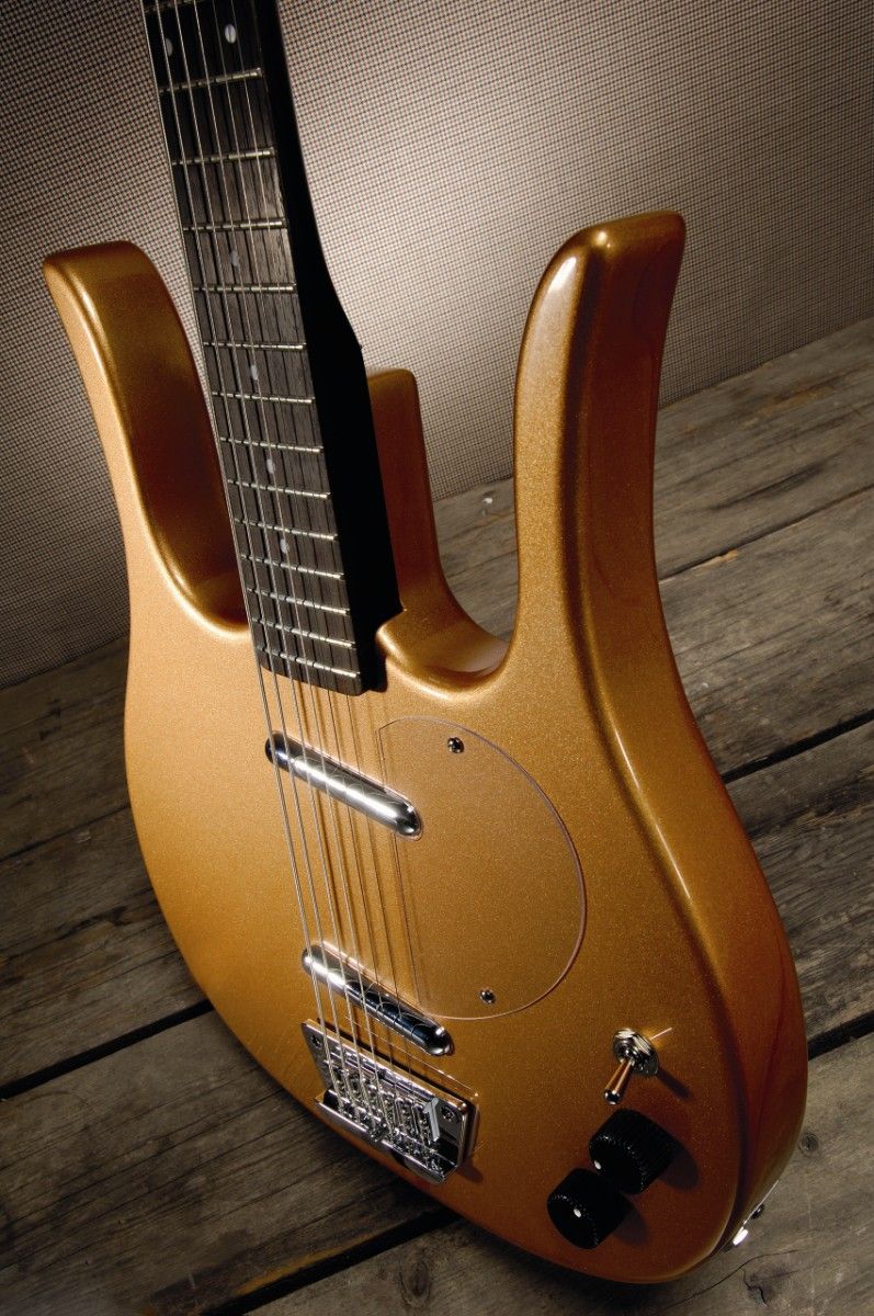 Body construction is of a laminate frame capped with Masonite (hardboard).