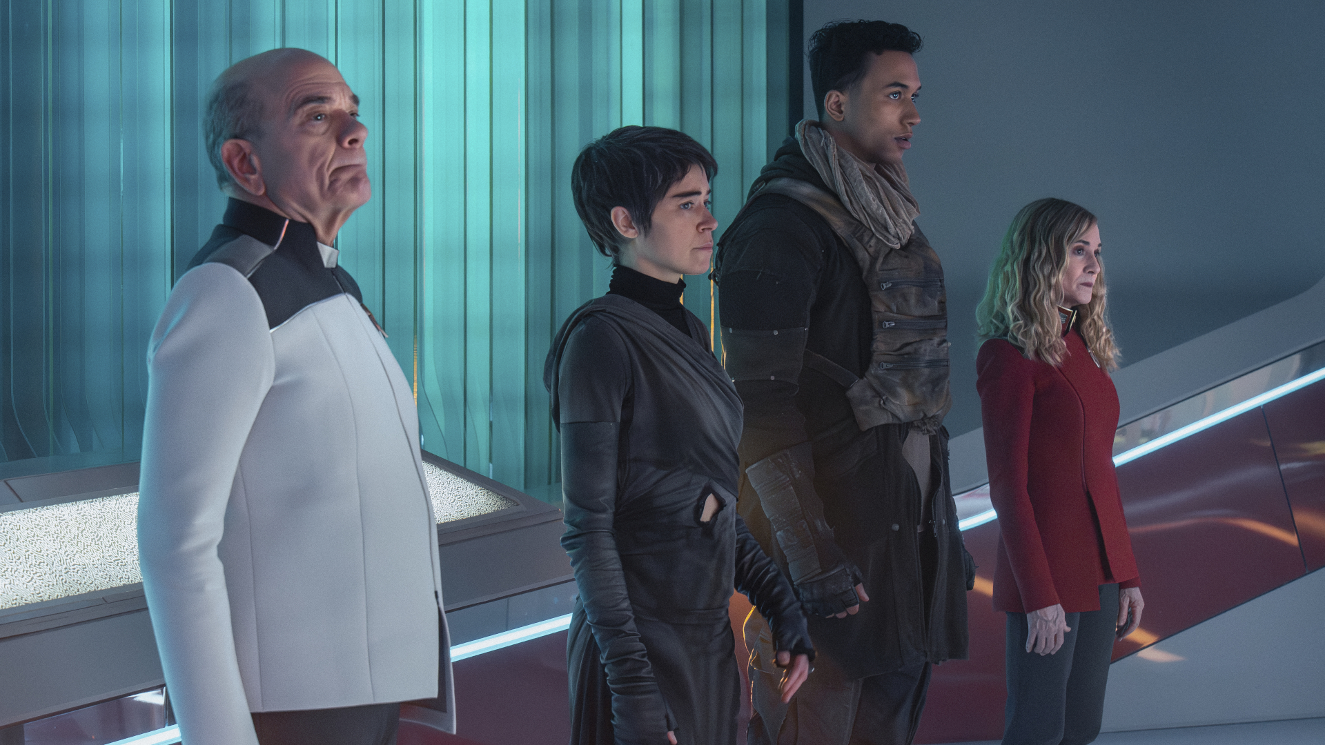 L-R: Robert Picardo as The Doctor, Tatiana Maslany as Anisha, Sandro Rosta as Caleb, and Holly Hunter as Captain Nahla Ake in season 1, episode 10, of Star Trek: Starfleet Academy.
