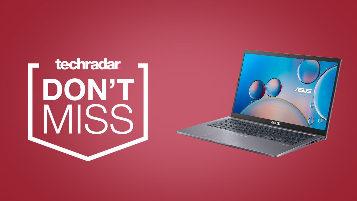 Asus VivoBook 15 laptop on a red background next to techradar deals don&#039;t miss badge