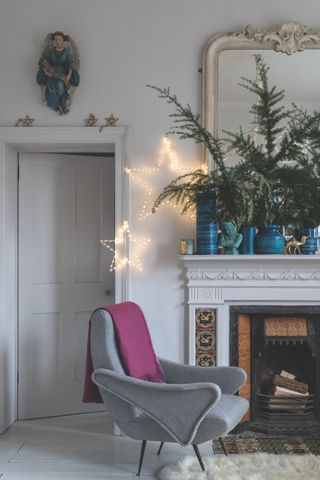 Elegant Christmas decorations in living room by Farrow & Ball