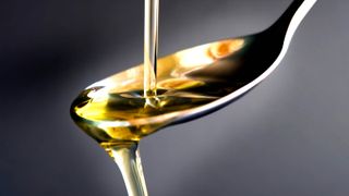 Oil dripping off a spoon