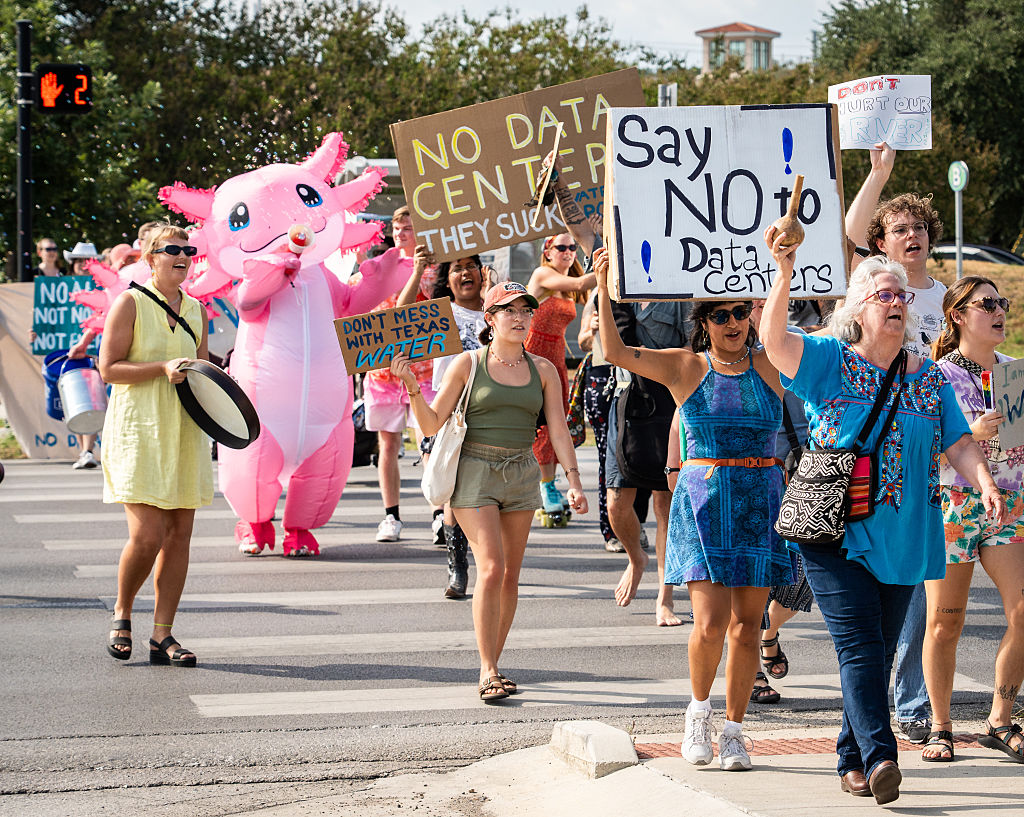 Protesters walk together in the March for Water and a Sustainable Future, Aug. 19, 2025.