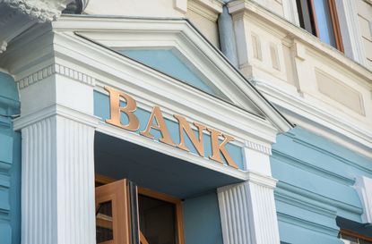 Bank sign on traditional europe building facade