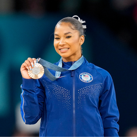 Jordan Chiles of USA celebrates during the Women's Artistic Gymnastics Floor Exercise Final medal ceremony on Day 10 of the Olympic Games Paris 2024 at Bercy Arena on August 5, 2024 in Paris, France.