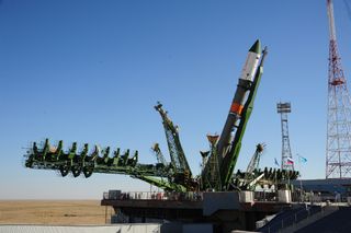 The Russian cargo ship Progress 64 and its Soyuz rocket are raised into launch position ahead of their planned July 16, 2016 launch from Baikonur Cosmodrome, Kazakhstan. 